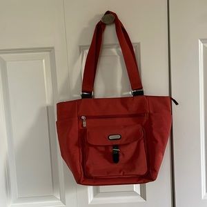 Large Baggallini tote. Great shape. Red/orange color. No smoking/no pets.